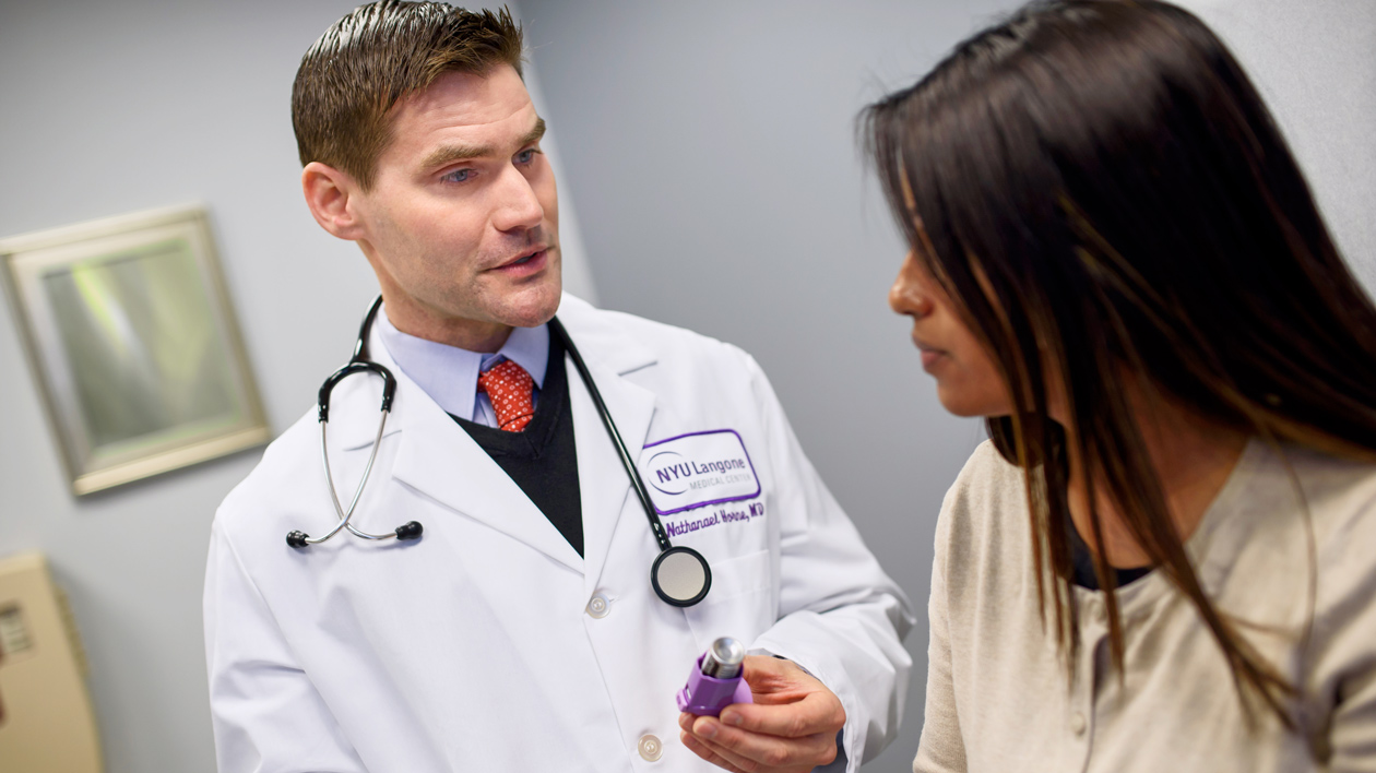 Doctor Speaking with Young Patient