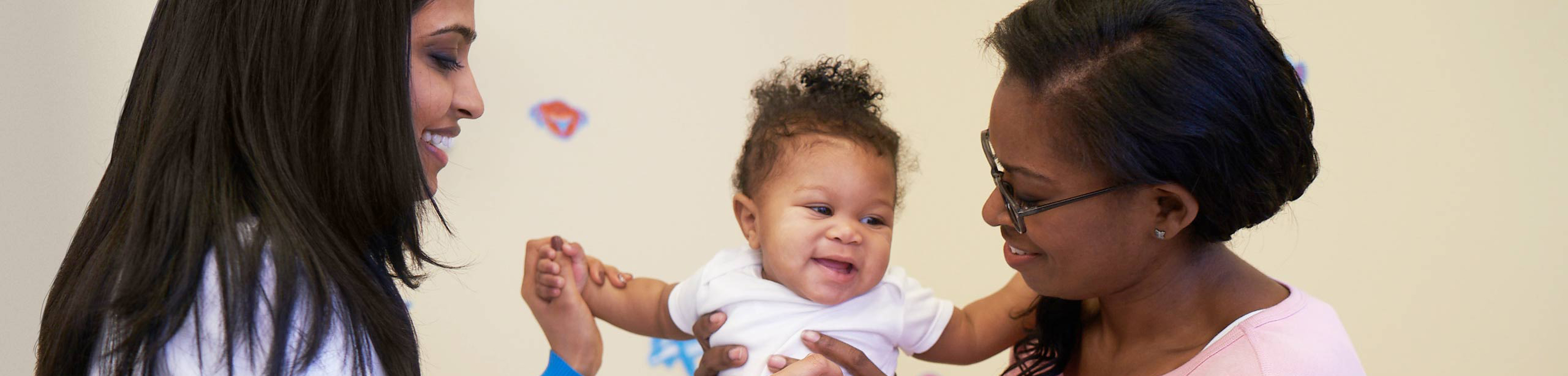 Caregiver with Pediatric Patient and Mother
