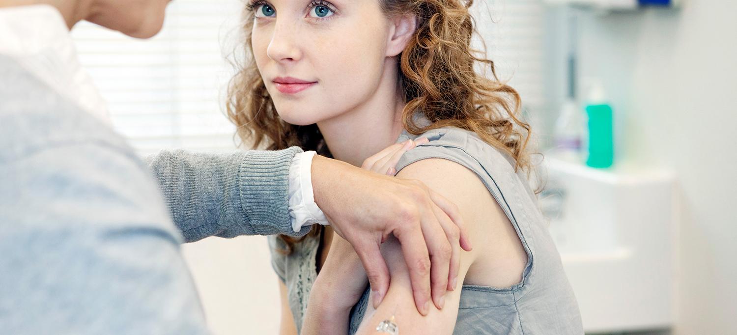 Woman Receives Vaccine