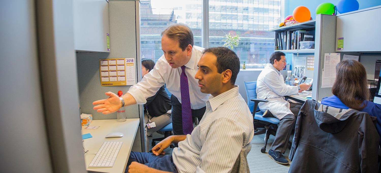 Dr. Douglas A. Levine with Colleague