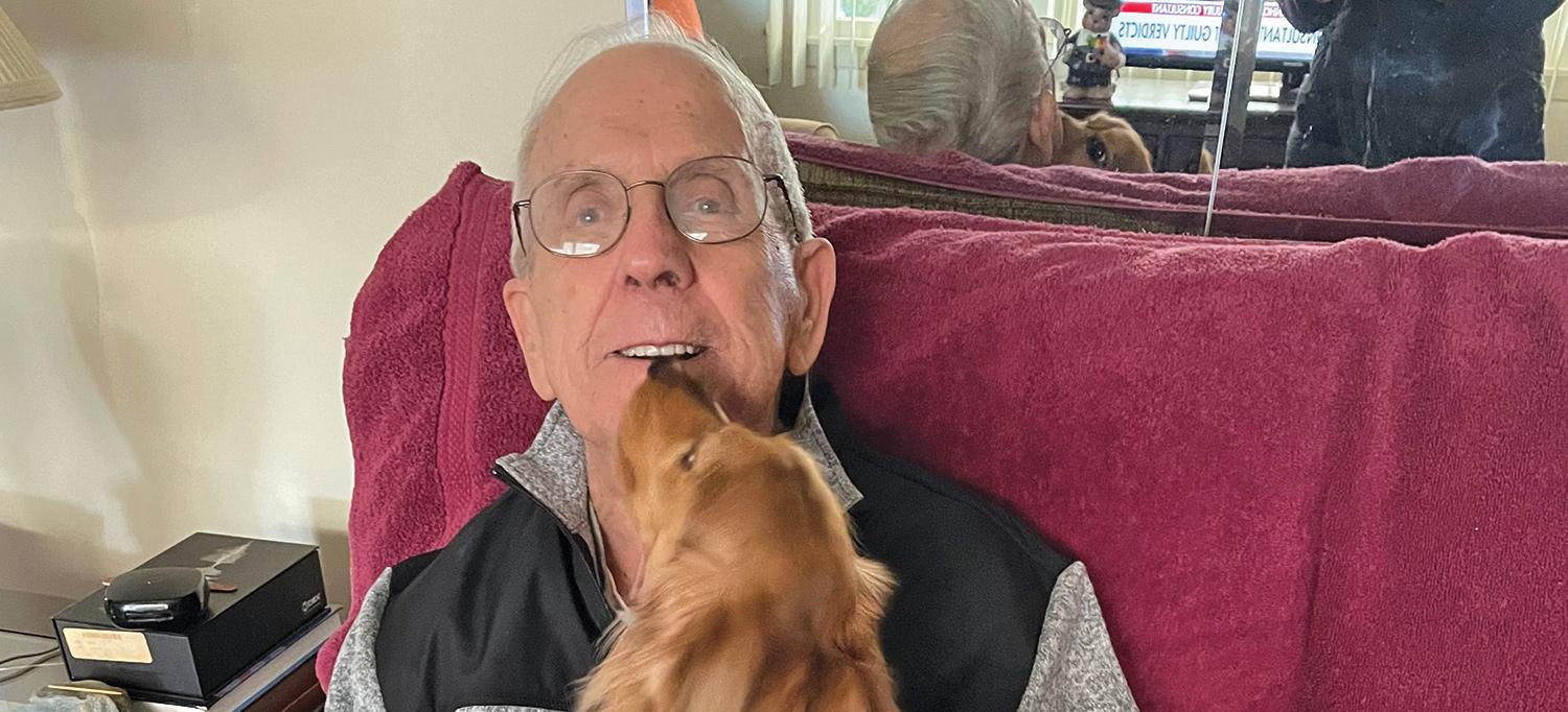 Edward Smith on Couch with Dog