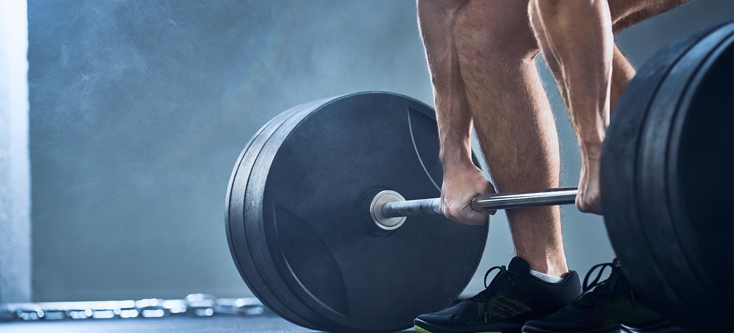 Person Holding Barbell
