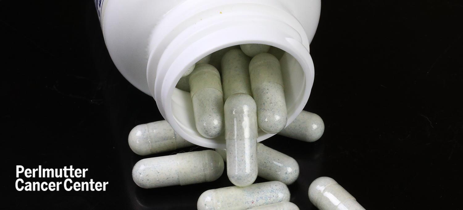 Pills Pouring Out of Bottle
