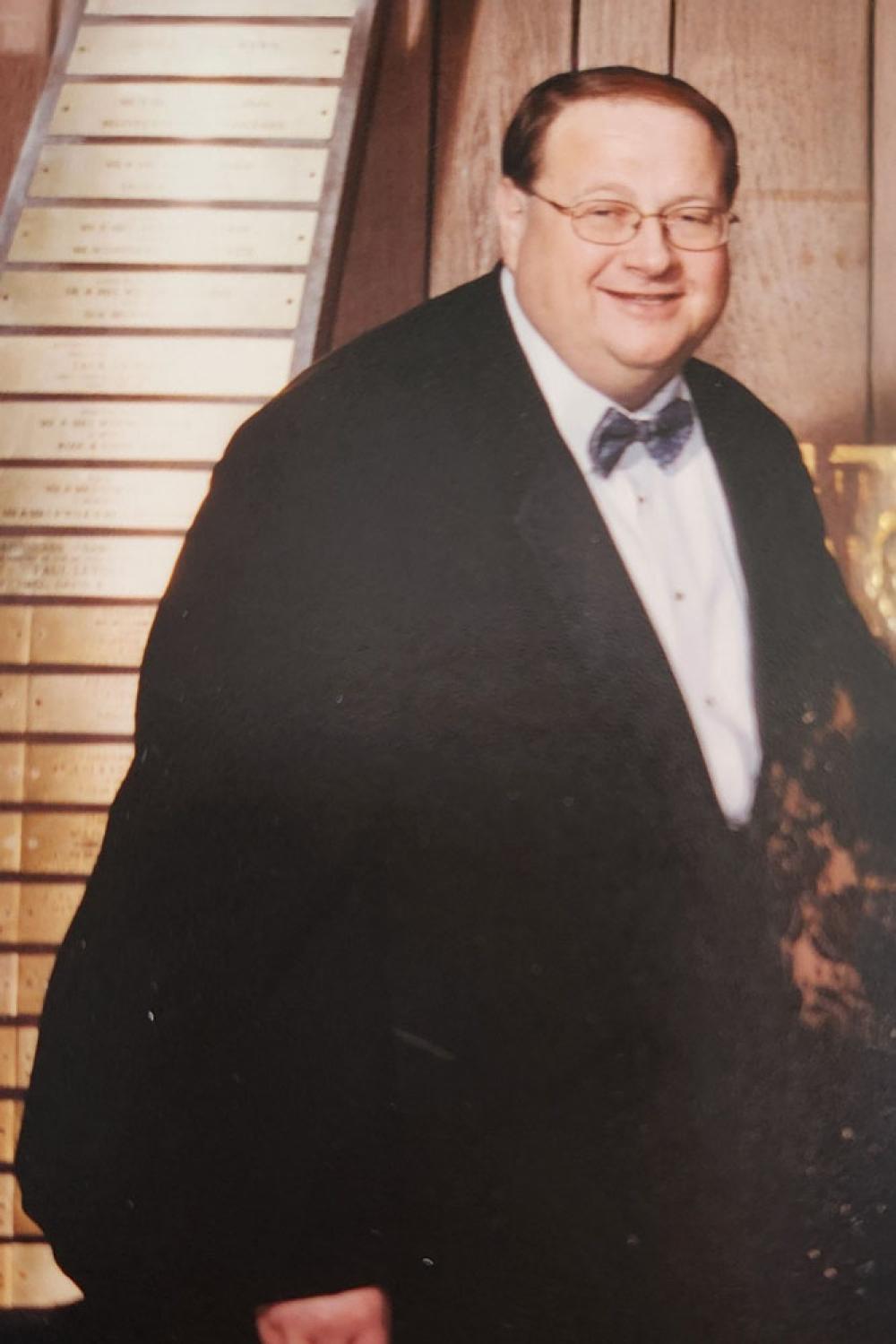 Agate wearing a tuxedo